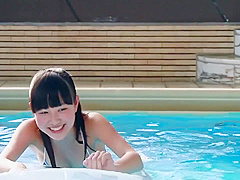 Adorable Chinese Girl in Bikini Outdoors