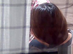 Asian babe in lingerie gets watched