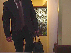 the husband is a villain, the wife is a spy