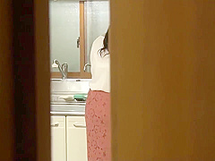 Ravishing Japanese housewife is getting a rear fuck in the kitchen, from her new lover