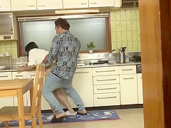 Ravishing Japanese housewife is getting a rear fuck in the kitchen, from her new lover