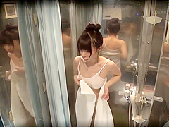 Asians fucking in a glass box outside