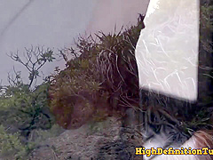 Japanese woman is getting her pussy licked on the beach, in the middle of the day