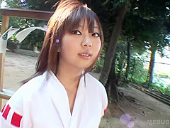 Shrine maiden in car with guys