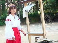 Shrine maiden in car with guys