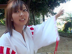 Shrine maiden in car with guys