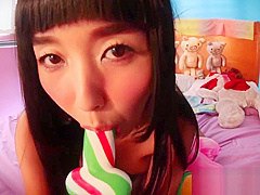 Marica Hase plays with candy cock