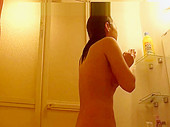 Japanese girl enjoys shower