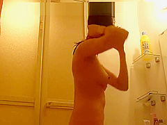 Japanese girl enjoys shower