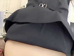 Dude holds geeky babe on a desk while another shoves a dildo in her